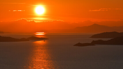 Fototapeta premium Beautiful sunset sky over western Skopelos, Sporades islands, Greece