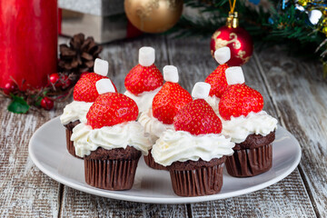 Strawberry and chocolate muffin Santa, Christmas menu for kids or party, horizontal