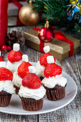Strawberry and chocolate muffin Santa, Christmas menu for kids or party, vertical