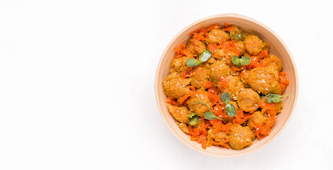 Vegan food concept. Soy meat with vegetables on a white plate. Copy space. Banner