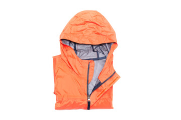 Folded orange zipper windbreaker jacket, rain proof and waterproof hiking Gore-Tex jacket hoodie....