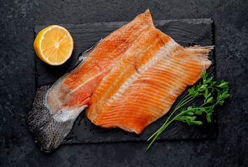 cold smoked salmon on a stone background