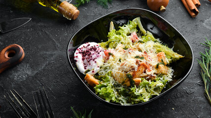 Vegetable salad with chicken fillet and poached egg. Caesar salad. Top view. Free copy space.