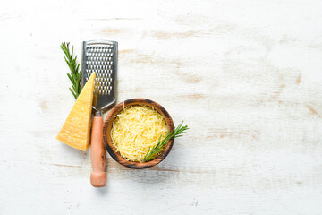 Grated Parmesan cheese in a bowl. Top view. Free space for your text. - Powered by Adobe