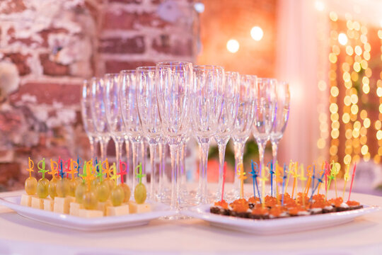 wine glasses and tapos, festive table