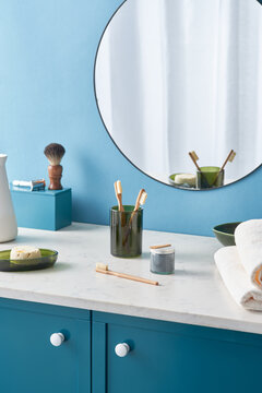 Ecological dental care supplies near mirror