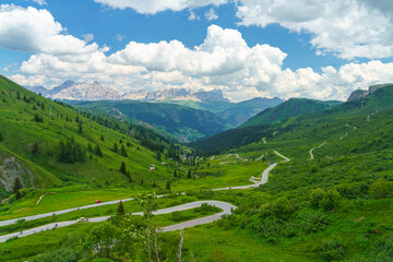 Fototapeta na wymiar Mountain landscape along the road to Pordoi pass, Dolomites