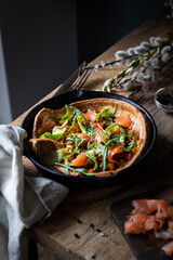 Dutch baby with salmon and avocado 