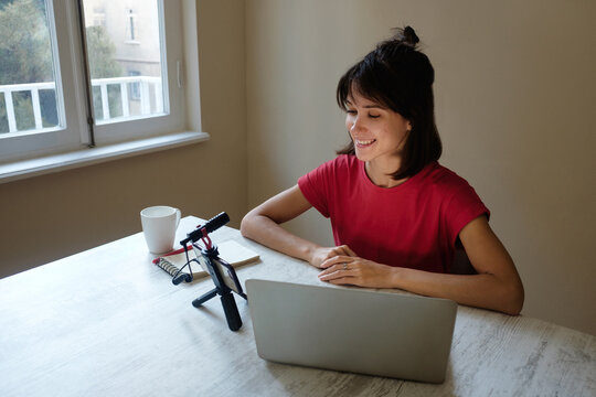 Podcast streaming young woman work from home