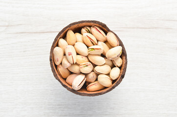 Tasty pistachio nuts. Top view. Free space for your text.