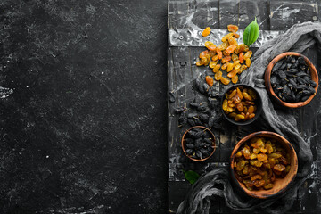 Delicious sweet raisins from grapes. Dried fruits. Top view. Free space for your text.