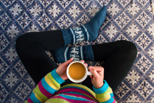 person with a cup of coffee, 