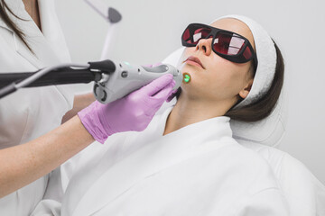 Woman receiving laser treatment