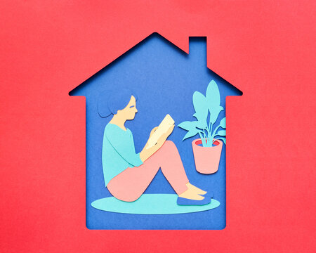 Lady reading book at home