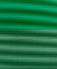 Obraz premium Textura de fachada metálica ondulada color verde