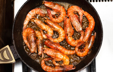 Delicious roasted grilled shrimps on pan 