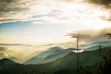 In the afternoon, a great atmosphere in the Himalayas, the sun's rays falling on the mountains through the clouds.