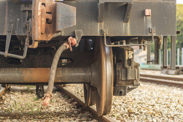 Fototapeta na wymiar Steel wheel of a wagon on a track 