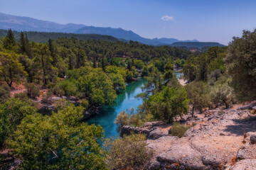 Fototapeta na wymiar Koprulu Canyon. A view of Kopru River and Koprulu Canyon. National Park in the province of Antalya, south western Turkey. July 2020, long exposure shot