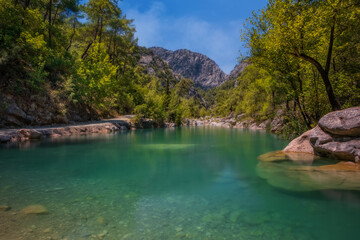 View of turquoise lake in canyon Goynuk, located inside the Beydaglari Coastal National Park, Kemer...