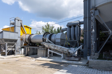 Naklejka premium Industrial production of construction mixtures. Tower silos with bulk ingredients. Line for drying and sorting of sand.