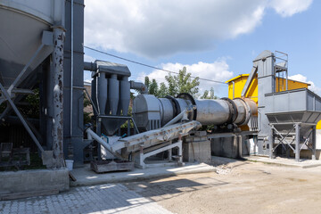 Industrial production of construction mixtures. Tower silos with bulk ingredients. Line for drying and sorting of sand.