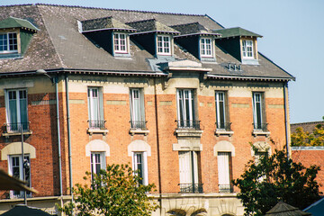 Fototapeta premium View of the facade of a historical building located in Reims, a city in the Grand Est region of France and one of the oldest in Europe