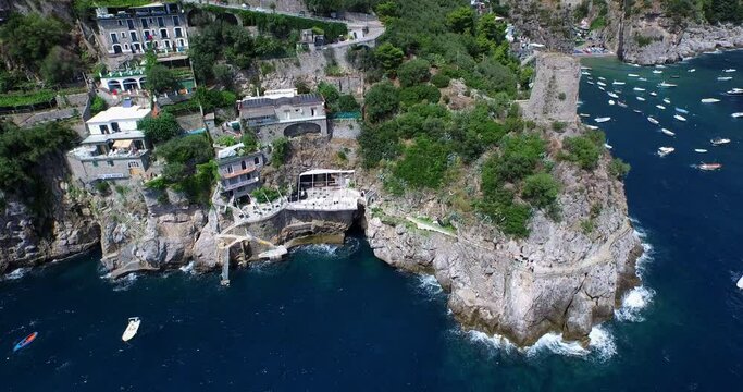 Tilt down aerial, coastal town on Amalfi Coast