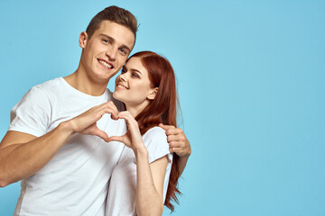 Portrait of man and woman on blue background Copy Space cropped view love family trust