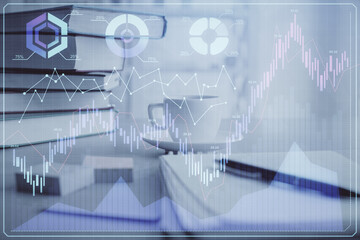 Double exposure of financial chart drawing and desktop with coffee and items on table background. Concept of forex market trading