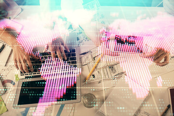 Double exposure of man and woman working together and business theme hologram drawing. Computer background. Top View.