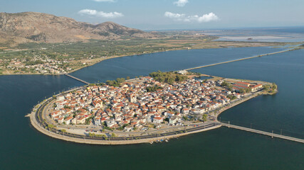 Aerial drone view of the famous island - fishing village of Aitoliko in Aetolia - Akarnania, Greece situated in the middle of Messolongi archipelago known as the Little Venice of Greece