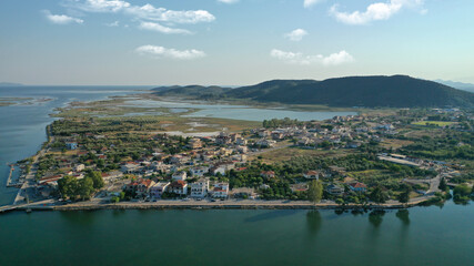 Fototapeta premium Aerial drone view of the famous island - fishing village of Aitoliko in Aetolia - Akarnania, Greece situated in the middle of Messolongi archipelago known as the Little Venice of Greece