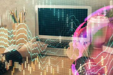 Double exposure of woman hands typing on computer and forex chart hologram drawing. Stock market invest concept.