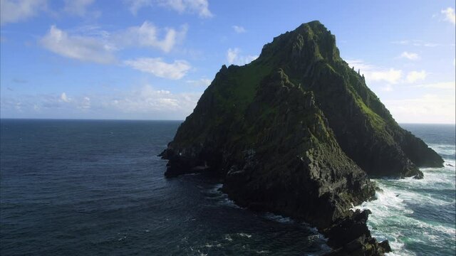 Wide aerial, rocky island off Ireland coast