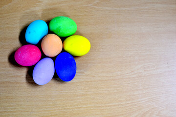 Closeup of Easter eggs on wooden Table background