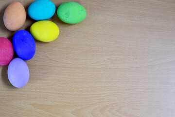 Closeup of Easter eggs on wooden Table background