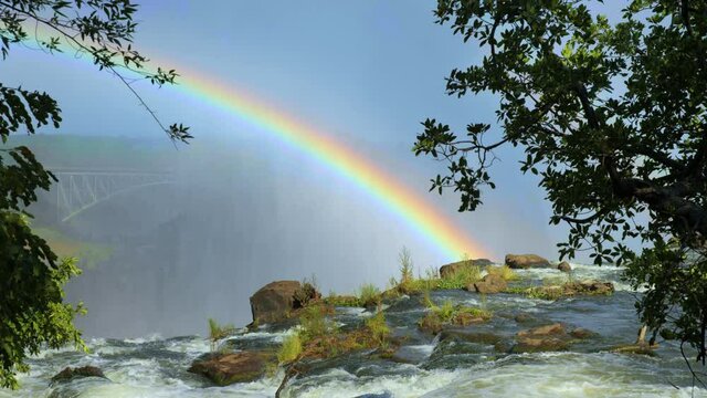 Rainbow over Victoria Falls in Zambia, medium shot