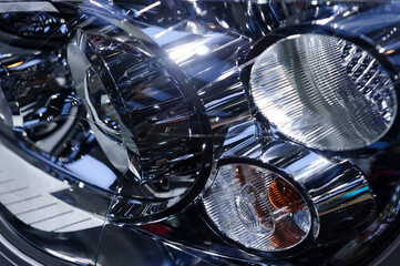 Headlight of big suv, abstract detail of car light equipment, automobile industry, selective focus 