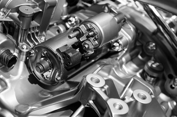 Car engine, concept of modern vehicle motor with metal, chrome details, automobile industry, monochrome shot, selective focus