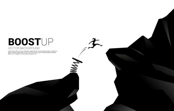 Silhouette of businesswoman jump over the gap with springboard. Concept of boost and growth in business.