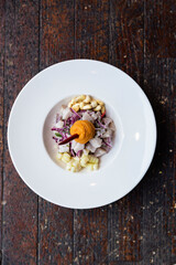 Ceviche with sweet potato, white corn and red onion. Peruvian food in the Mediterranean of the island of Majorca.
