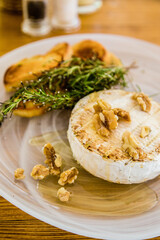 Provoleta with nuts and salad. Mediterranean dish from the island of Majorca.
