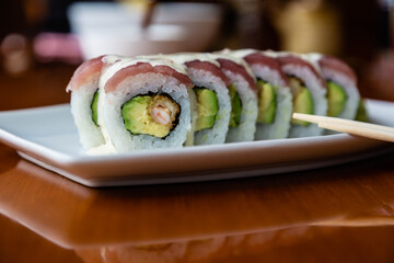 Asian food. Sushi rolls. Chinese sticks.