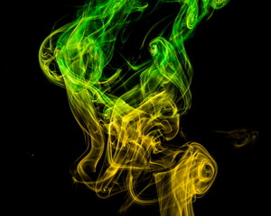 Colored smoke on black background