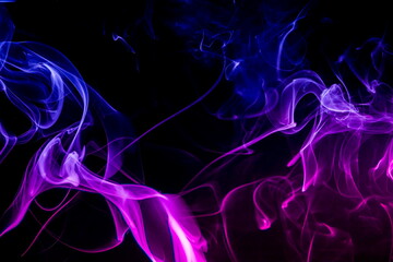 Colored smoke on black background