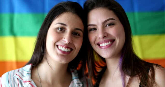 Portrait of LGBT lesbian girlfriends smiling at camera