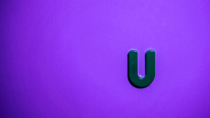 letter of the anguilla alphabet on a pink background