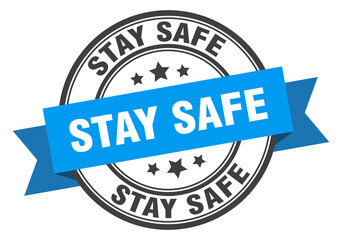 stay safe label sign. round stamp. band. ribbon