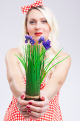 Caucasian Blond Female Holding Bunch of Lilac  Flowers in Hands.